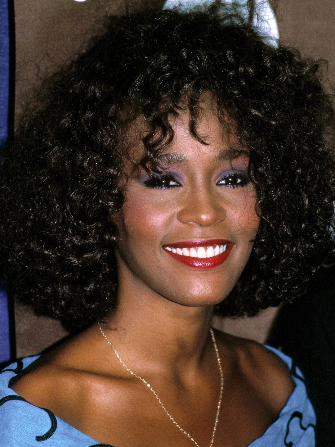 How tall is Whitney Houston?